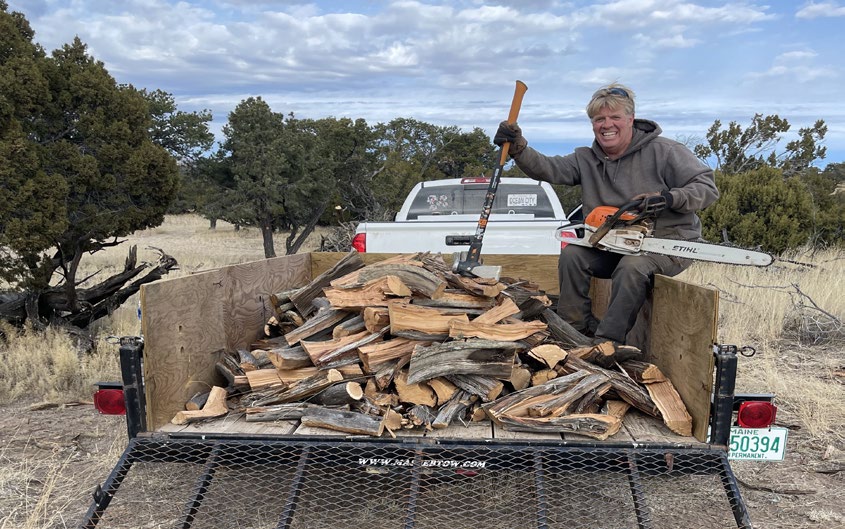 Truck trailer loaded with split firewood